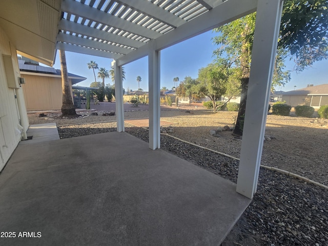 view of patio featuring a pergola