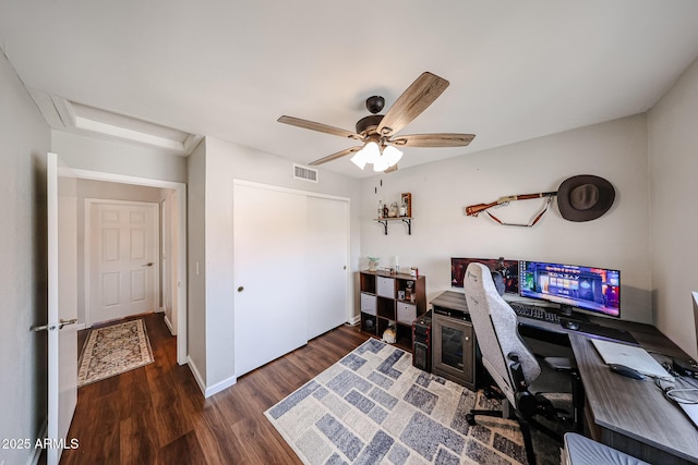 7110 N 28th Dr, Phoenix, AZ 85051 - office space featuring wood finished floors, a ceiling fan, and attic access