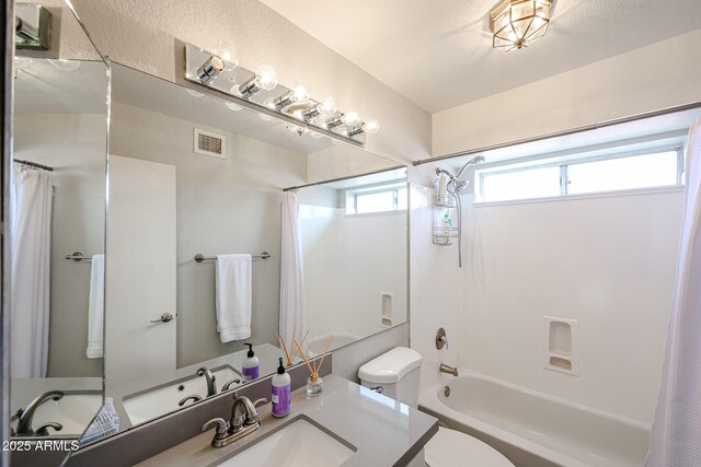 7110 N 28th Dr, Phoenix, AZ 85051 - full bath with toilet, shower / tub combo, and vanity
