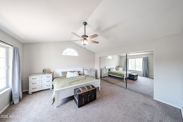 7110 N 28th Dr, Phoenix, AZ 85051 - bedroom with carpet flooring, vaulted ceiling, a ceiling fan, and baseboards