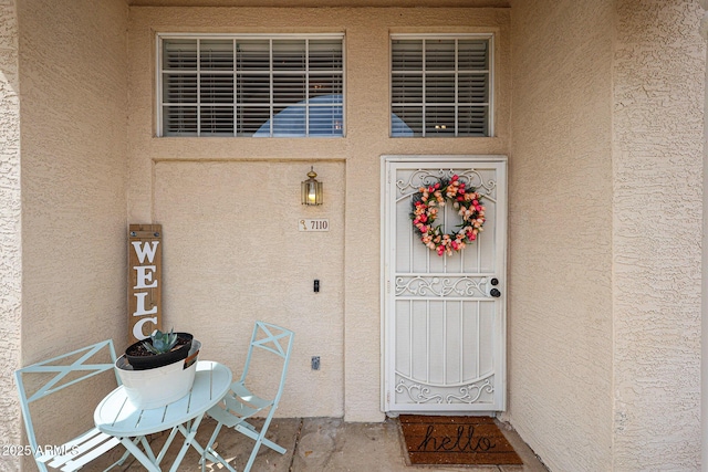 7110 N 28th Dr, Phoenix, AZ 85051 - view of exterior entry featuring stucco siding