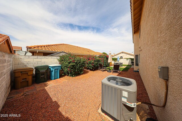 7110 N 28th Dr, Phoenix, AZ 85051 - fenced backyard with cooling unit and a patio