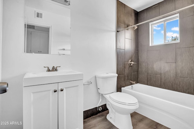 31 W 2nd St, Mesa, AZ 85201 - full bath featuring vanity, washtub / shower combination, and wood finished floors