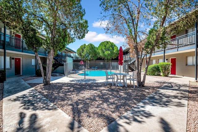 31 W 2nd St, Mesa, AZ 85201 - community pool featuring stairway and a patio area