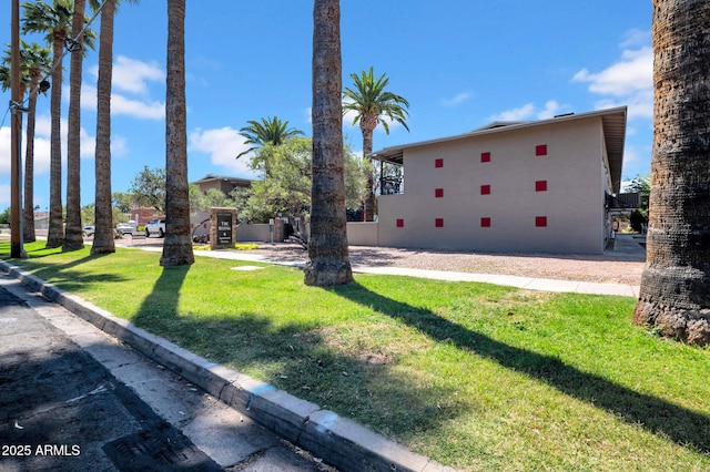 31 W 2nd St, Mesa, AZ 85201 - view of side of property featuring a yard