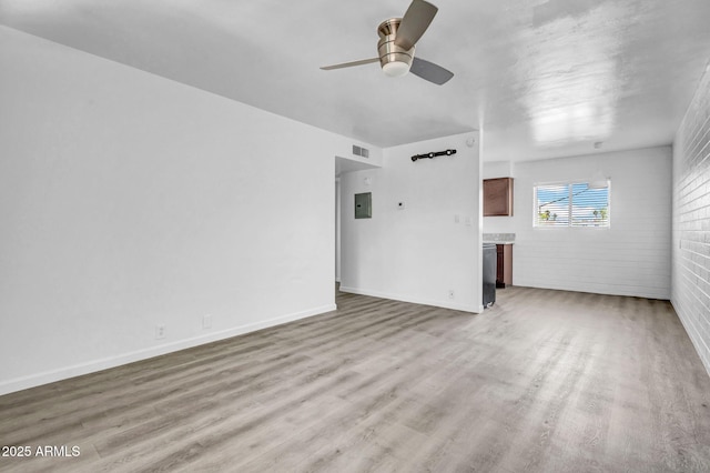 31 W 2nd St, Mesa, AZ 85201 - unfurnished living room featuring ceiling fan, electric panel, and wood finished floors