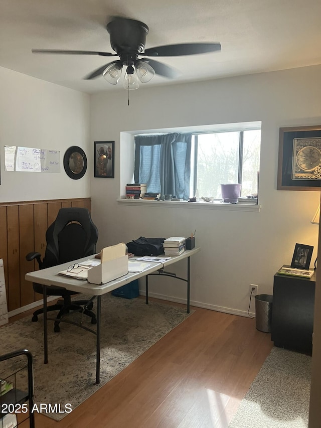 office featuring ceiling fan and hardwood / wood-style floors