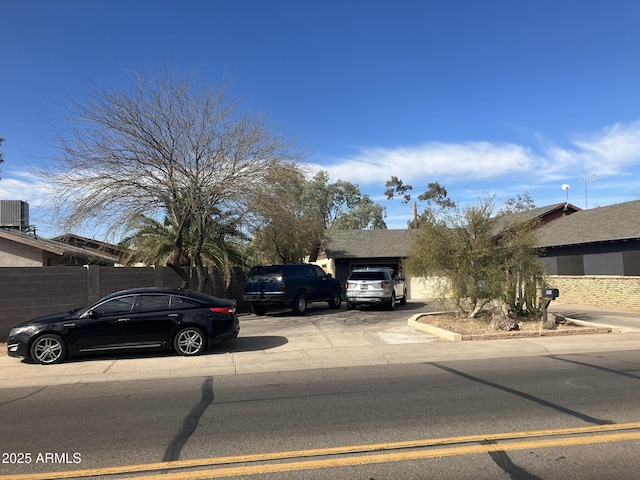 view of front of property featuring cooling unit