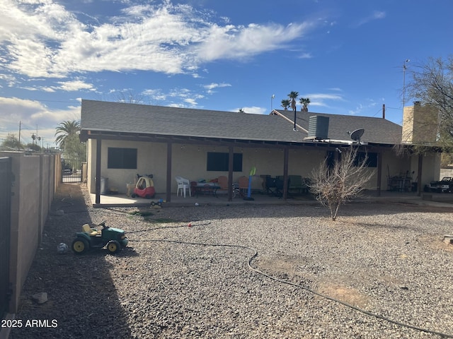 back of property featuring a patio area