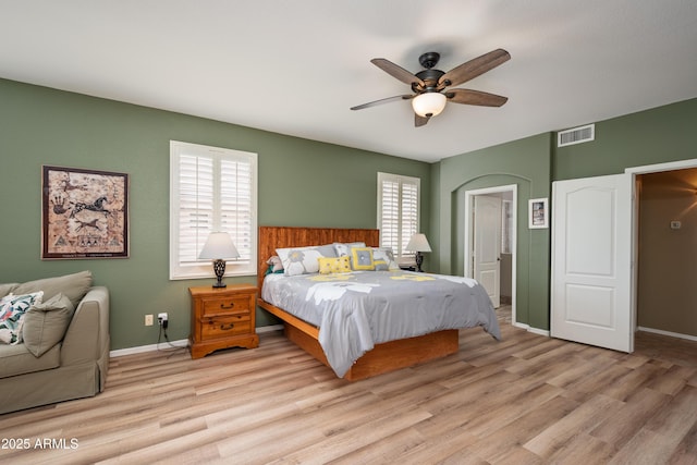 bedroom featuring light hardwood / wood-style flooring and ceiling fan