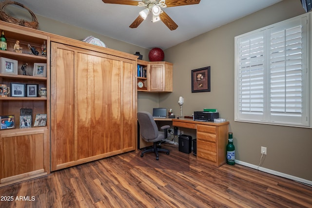 office area with dark hardwood / wood-style flooring and ceiling fan