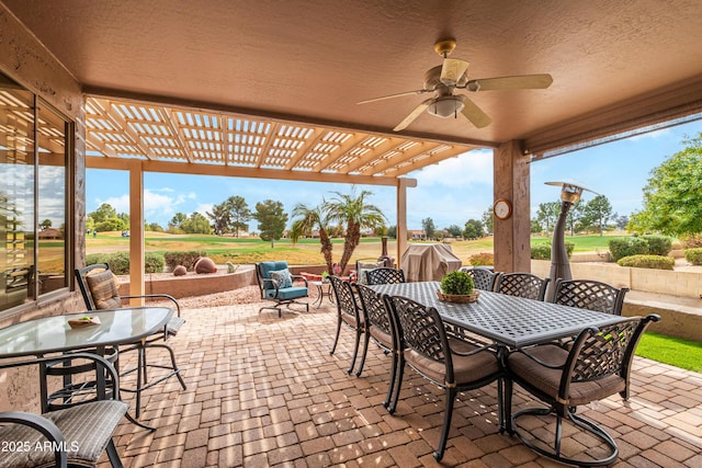 view of patio featuring ceiling fan and a pergola