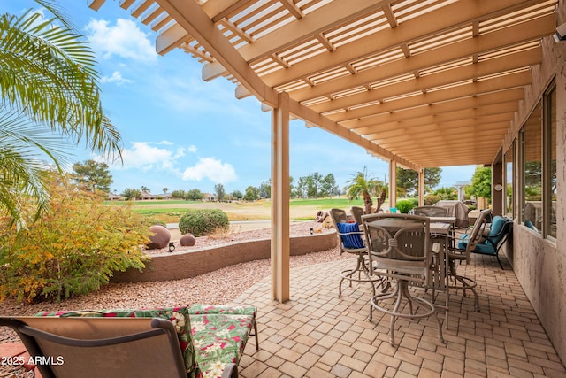 view of patio featuring a pergola