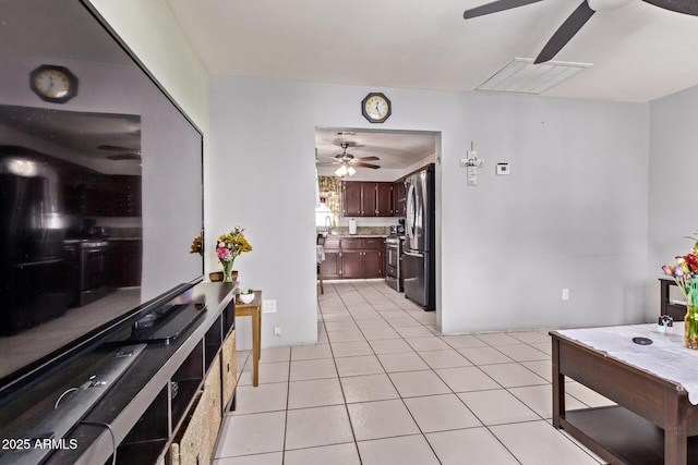 3525 W Latham St, Phoenix, AZ 85009 - living room with ceiling fan and light tile patterned floors