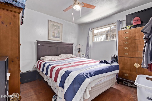 3525 W Latham St, Phoenix, AZ 85009 - bedroom with wood finished floors and ceiling fan