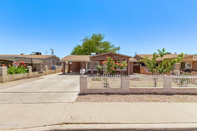 3525 W Latham St, Phoenix, AZ 85009 - single story home with driveway, a fenced front yard, a carport, and stucco siding
