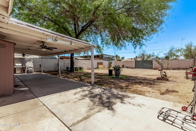 3525 W Latham St, Phoenix, AZ 85009 - fenced backyard featuring ceiling fan and a patio area