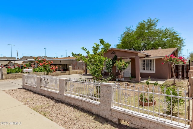 3525 W Latham St, Phoenix, AZ 85009 - single story home featuring a fenced front yard and stucco siding