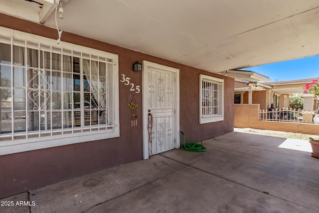 3525 W Latham St, Phoenix, AZ 85009 - entrance to property featuring stucco siding and a porch