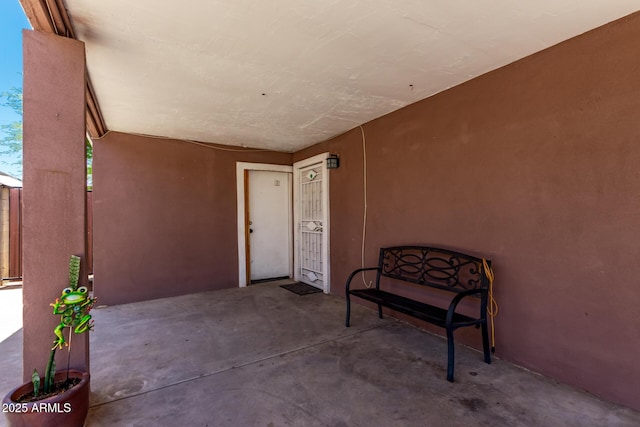 3525 W Latham St, Phoenix, AZ 85009 - property entrance featuring a patio and stucco siding
