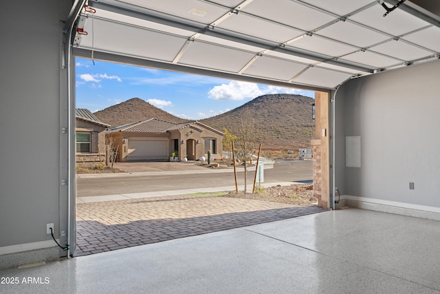 garage featuring a mountain view