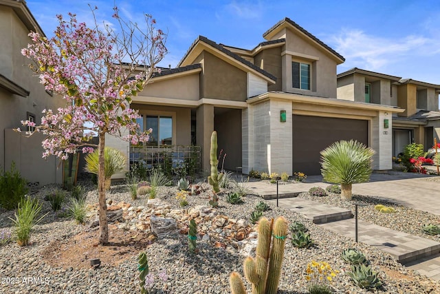 21112 N 60th Pl, Phoenix, AZ 85054 - view of front of house featuring a garage, stucco siding, driveway, and a tile roof