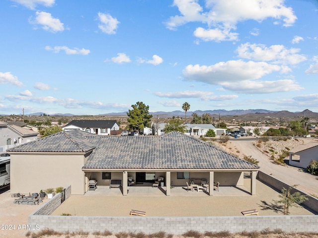 exterior space featuring a mountain view