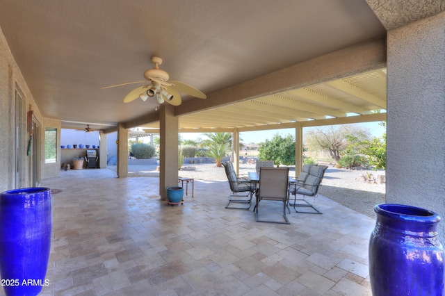 view of patio / terrace featuring ceiling fan