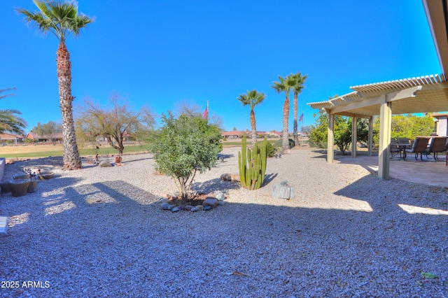 view of yard with a patio area and a pergola