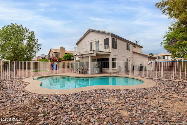 view of pool with fence and a fenced in pool