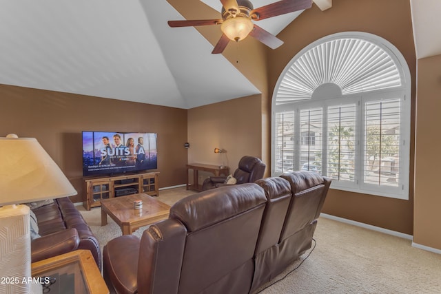 living room with carpet flooring, vaulted ceiling, and baseboards