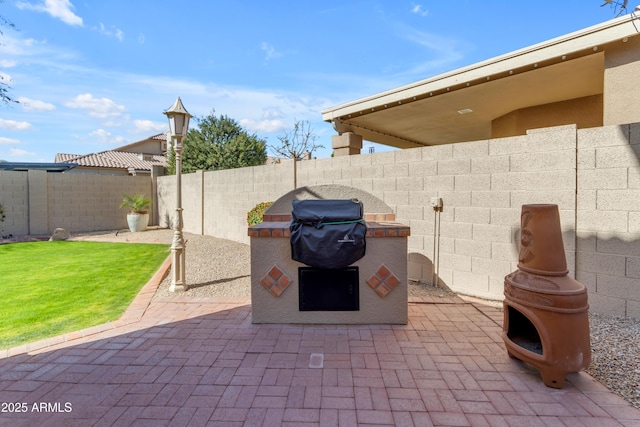 view of patio featuring a fenced backyard