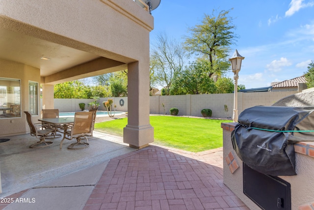 view of patio with a fenced backyard and a fenced in pool