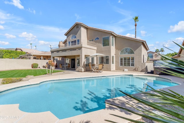 view of pool featuring a patio area, fence, and a fenced in pool