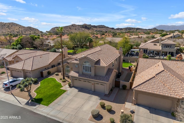 aerial view with a residential view and a mountain view