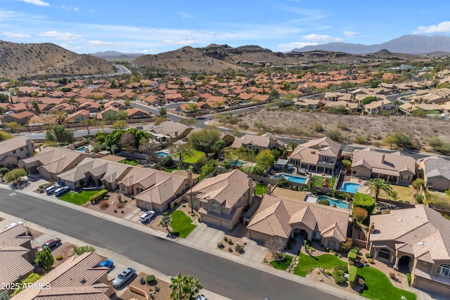 bird's eye view with a residential view and a mountain view