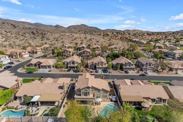 birds eye view of property featuring a residential view and a mountain view