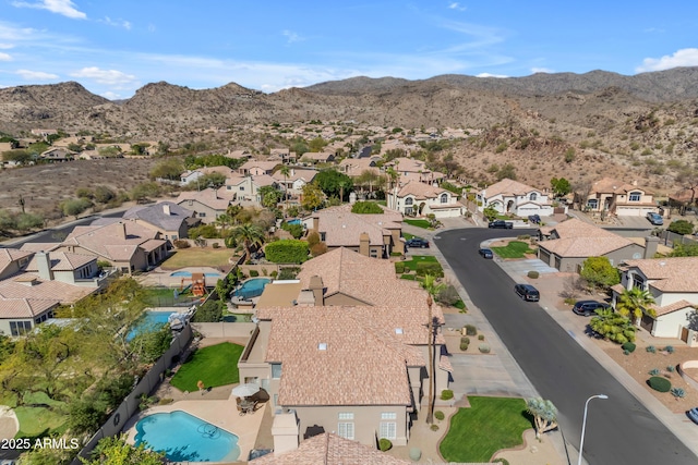 aerial view featuring a residential view and a mountain view