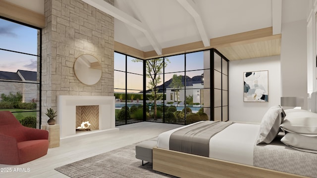 bedroom featuring a stone fireplace, high vaulted ceiling, and beamed ceiling