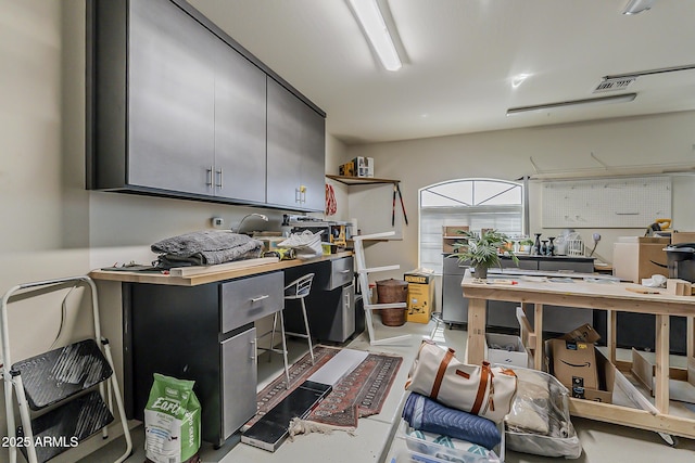 interior space featuring a workshop area