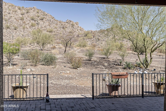 view of patio / terrace featuring a mountain view