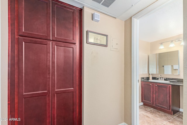 bathroom featuring vanity and tile patterned floors