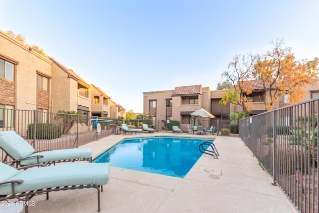 view of pool featuring a patio