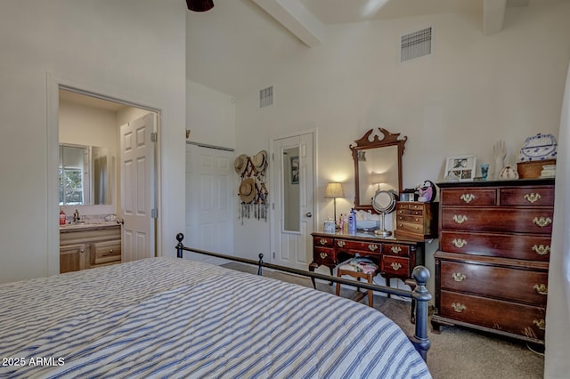 4090 N Cherri Lynn Dr, Pine, AZ 85544 - bedroom with beamed ceiling, carpet flooring, ensuite bath, high vaulted ceiling, and a sink