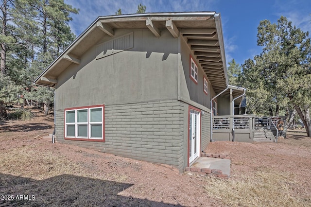 4090 N Cherri Lynn Dr, Pine, AZ 85544 - view of property exterior featuring a wooden deck and brick siding