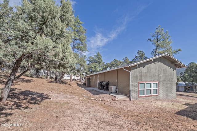 4090 N Cherri Lynn Dr, Pine, AZ 85544 - back of property with brick siding