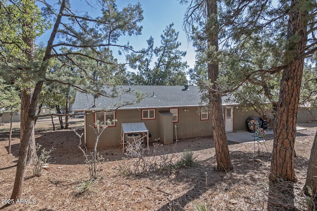 4090 N Cherri Lynn Dr, Pine, AZ 85544 - rear view of house featuring roof with shingles