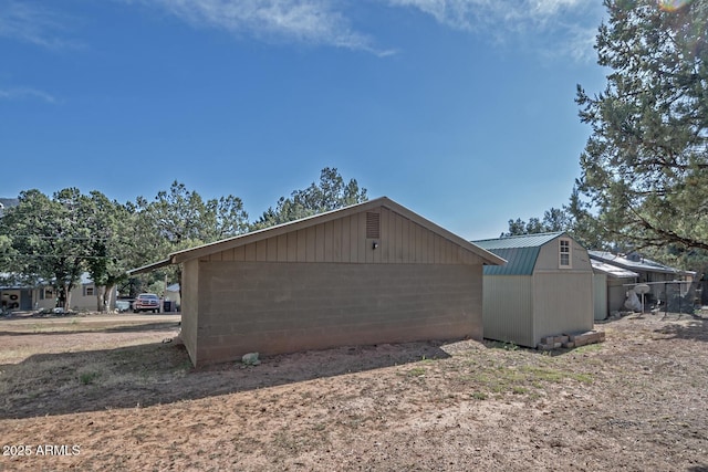 4090 N Cherri Lynn Dr, Pine, AZ 85544 - view of home's exterior with concrete block siding and metal roof