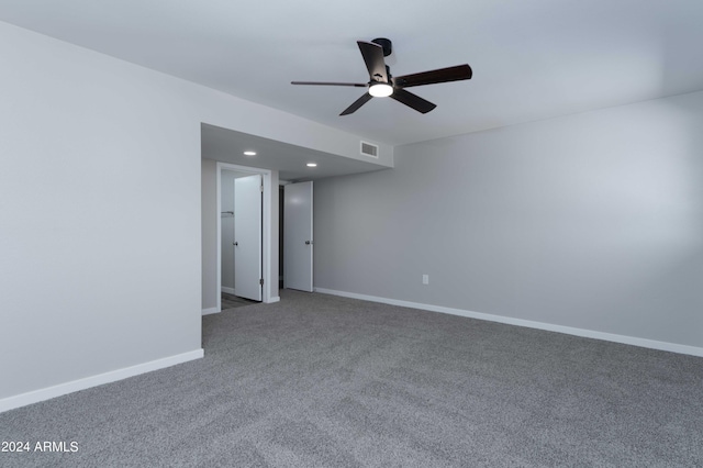 spare room with carpet flooring and ceiling fan