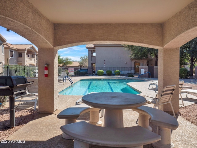 14000 N 94th St Unit 1008, Scottsdale, AZ 85260 - community pool with fence and a patio